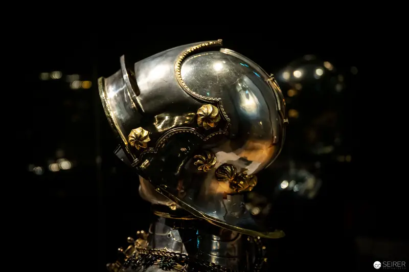 Baroque Astronaut Helmet with Ornate Gold Detailing Against Night Backdrop