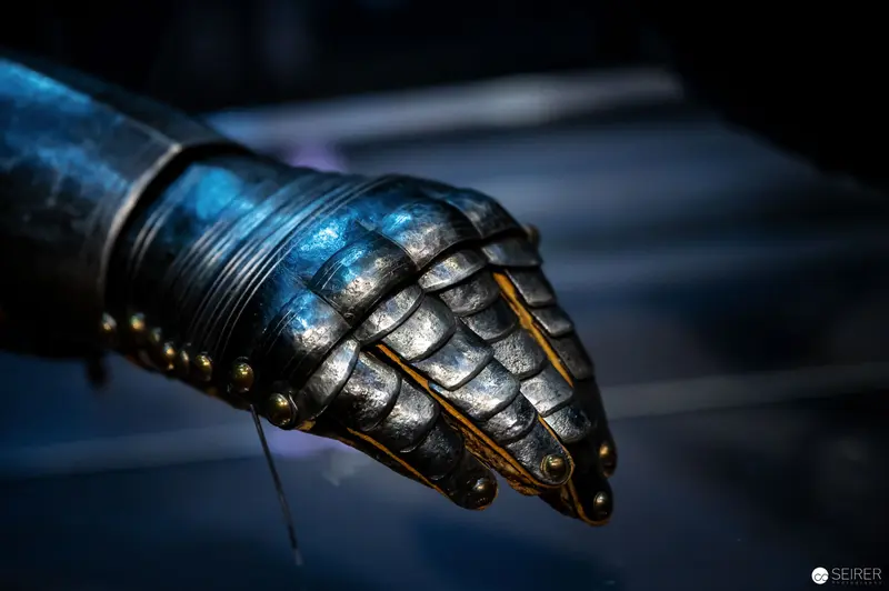 Medieval Articulated Gauntlet in Dramatic Blue-Gray Metallic Lighting