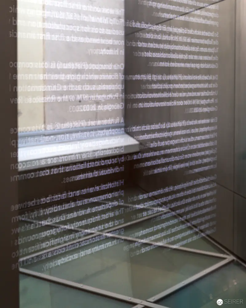 Fragmented Binary Patterns in Architectural Glass Installation at Heidi Horten Collection