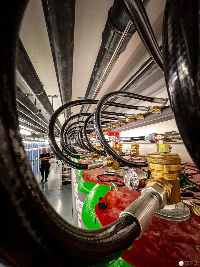 Architectural Interior with Curved Pipes and Technical Infrastructure at CIM Wien
