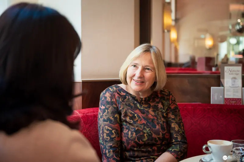 Ute Krause in Conversation with Interviewer at Intimate Cafe Setting