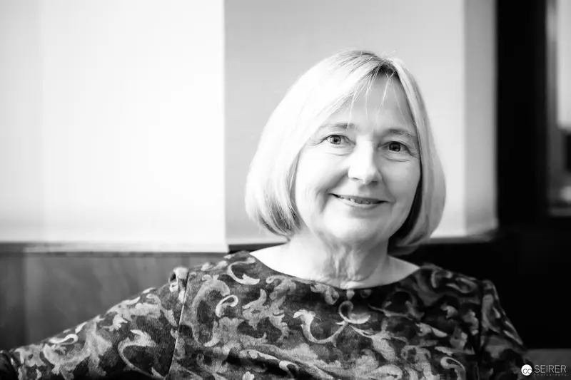 Ute Krause, Author and Interviewee in Contemplative Black and White Portrait