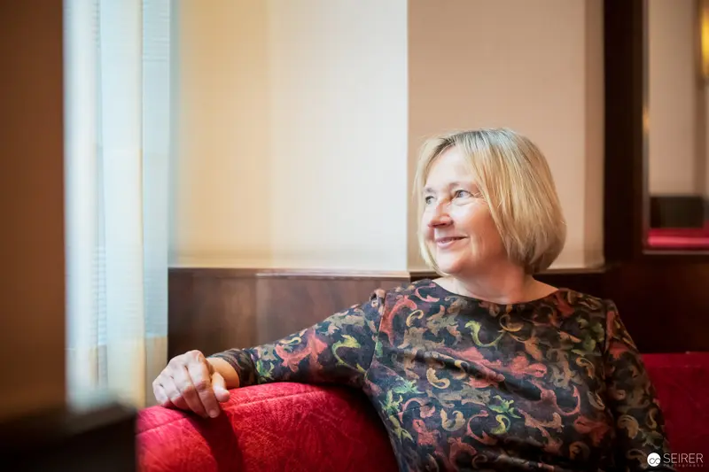 Ute Krause in Reflective Moment during Interview with Janett Cernohuby