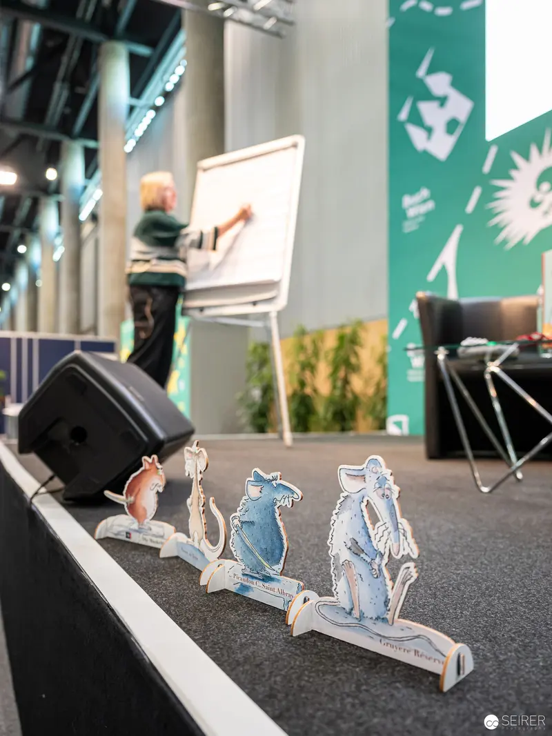 Cardboard Mice Silhouettes on Presentation Stage at Book Fair Vienna