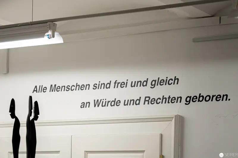 Universal Human Rights Declaration in Minimalist Interior Setting