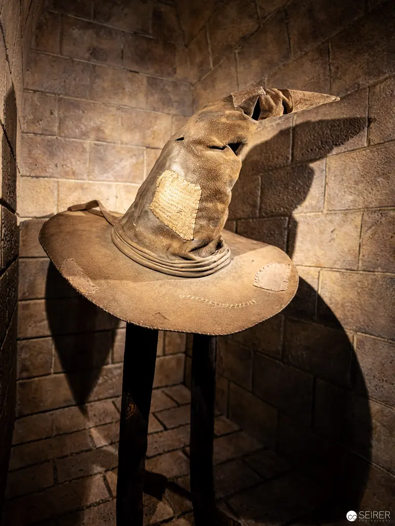 Sorting Hat on Pedestal: Magical Artifact from Harry Potter Exhibition, Vienna