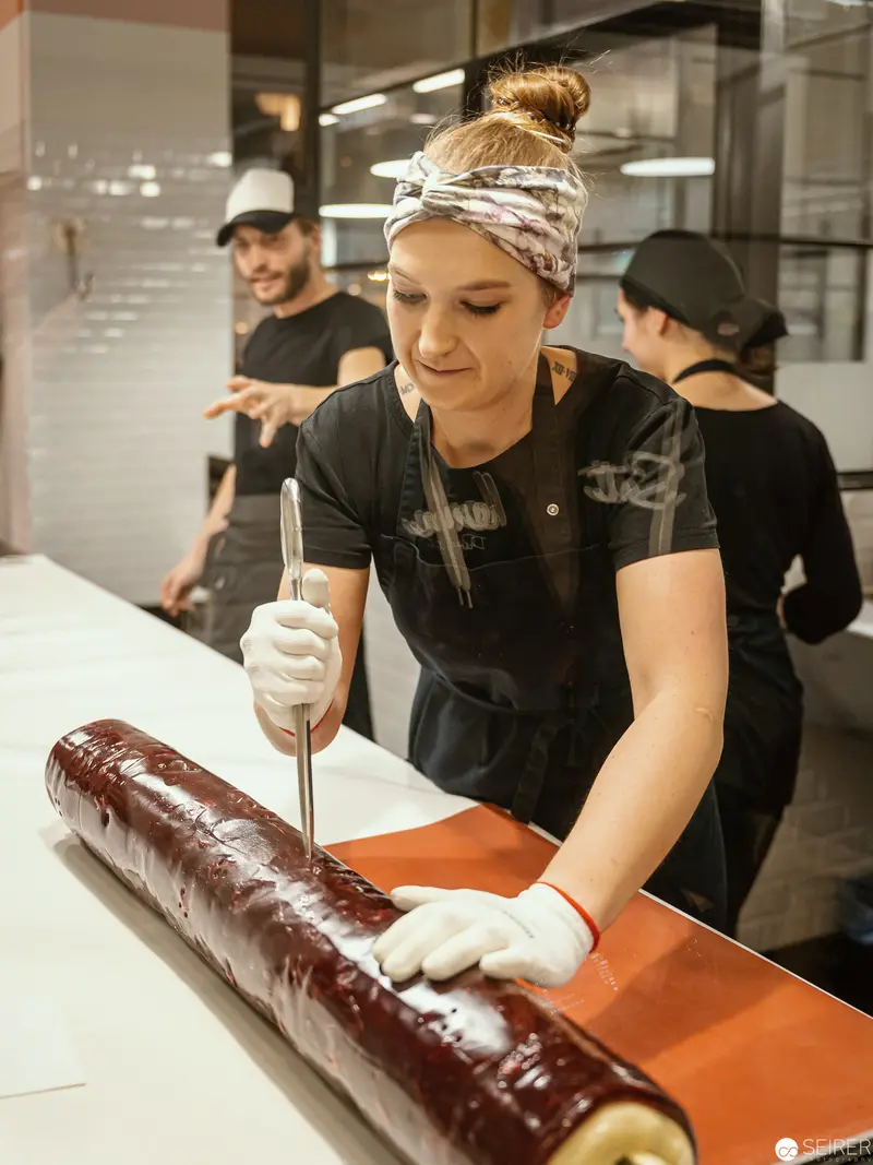 Master Confectioner Crafting Chocolate Roll at Traditional Zuckerlwerkstatt Wien Workshop