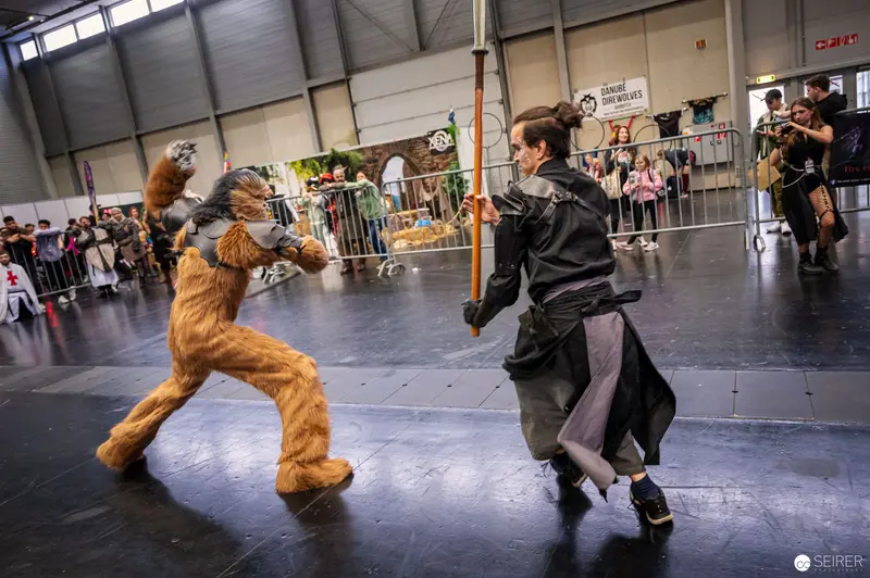 Fursuiter and Cosplayer Engage in Staged Combat at Vienna ComicCon 2022