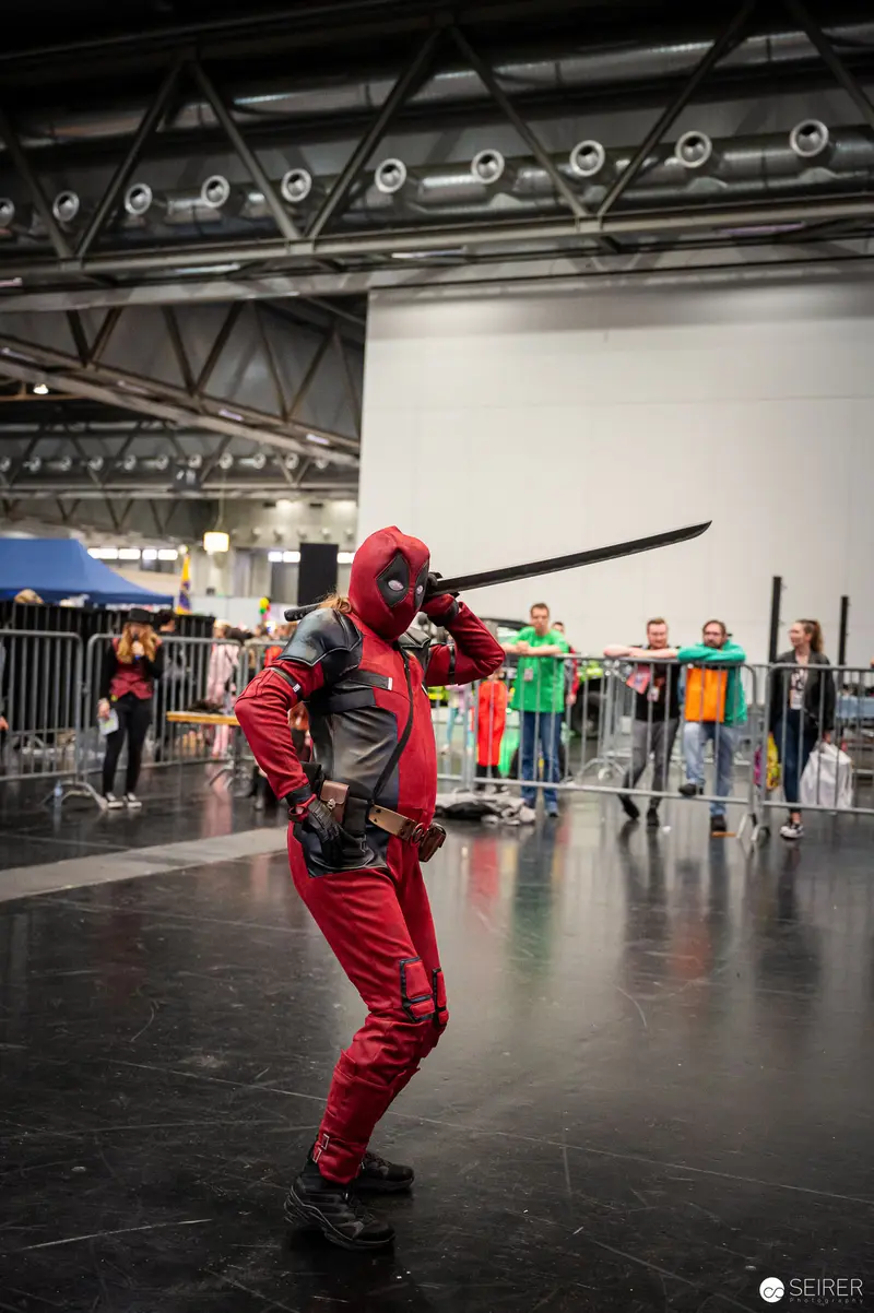 Deadpool Cosplayer Wielding Sword at Vienna ComicCon 2022 Performance