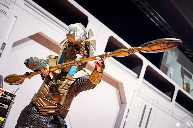 Elaborate Cosplay Warrior Wielding Paddle at Vienna ComicCon 2022 Championship