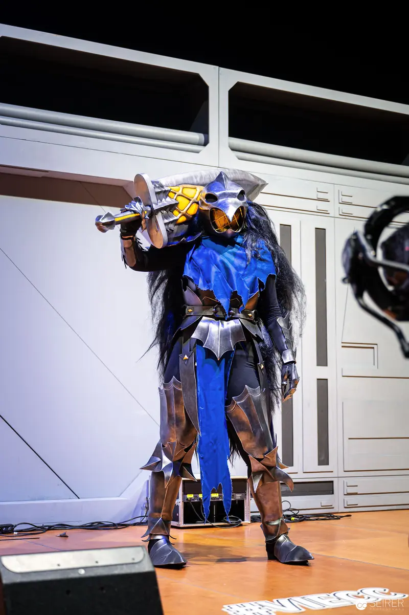 Cosplay Central Crown Championship Contestant in Elaborate Blue and Metallic Armor Costume