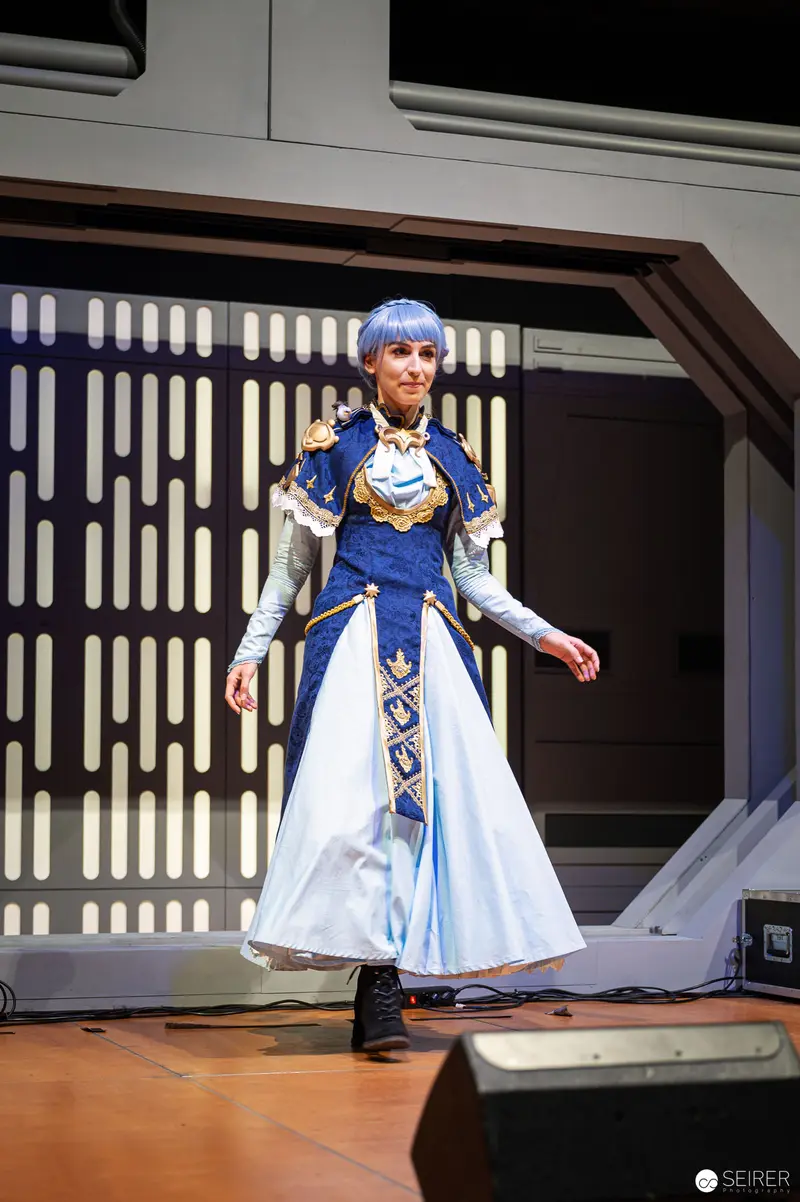Blue and White Cosplay Performer at Vienna ComicCon 2022 Costume Championship