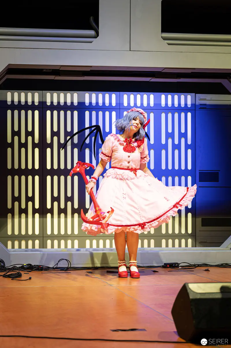 Cosplayer in Pink Dress Performing at Vienna ComicCon 2022 Cosplay Championship