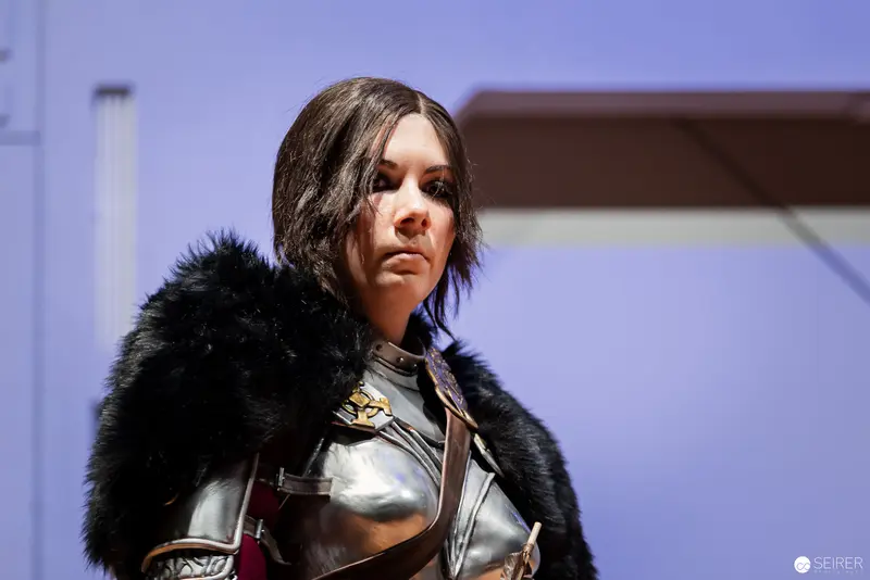 Medieval Fantasy Cosplay Figure in Fur and Metal Armor at VIECC 2022