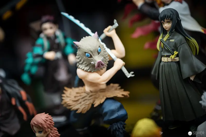 Demon Slayer Figurines Arranged at Vienna ComicCon Collectibles Display