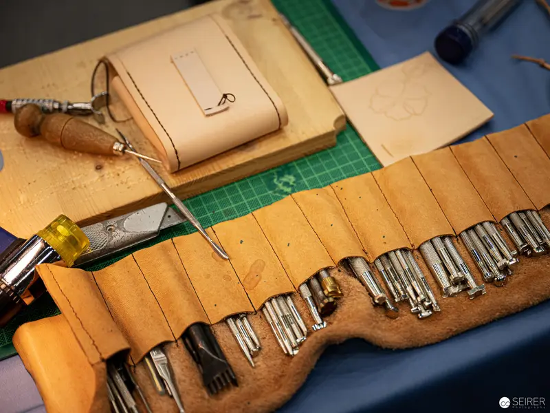 Artisan Leatherworking Tools Arranged on Cutting Mat