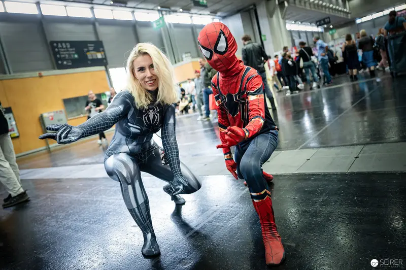 Spider-Man and Female Symbiote Cosplayers Posing at Vienna ComicCon 2022