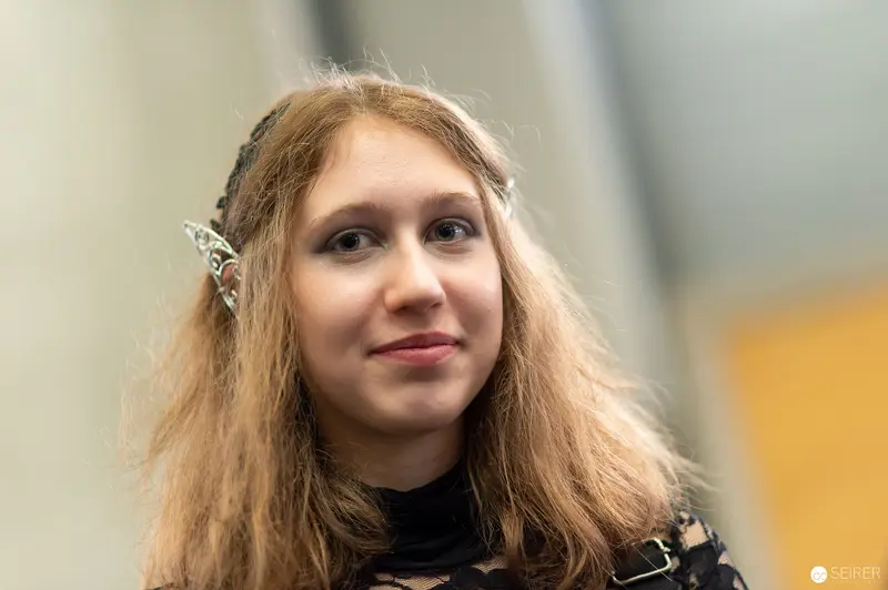 Cosplay Enthusiast in Elegant Attire at Vienna ComicCon 2022