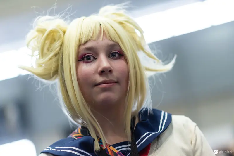 Blonde Cosplayer in Sailor-Style Outfit at Vienna ComicCon 2022