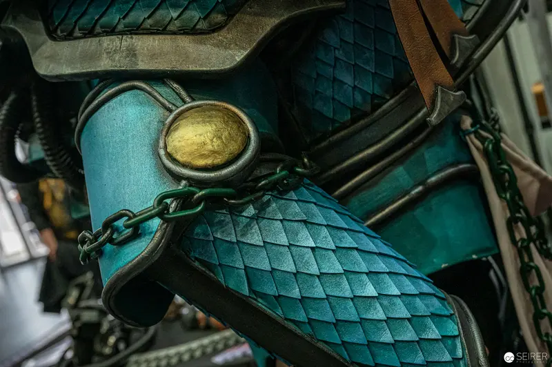 Metallic Steampunk Detail with Teal Quilted Armor and Chained Golden Medallion