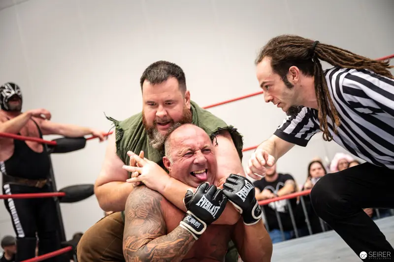 Watschclub Wrestling Performance at Vienna ComicCon 2022: Intense Grappling Moment