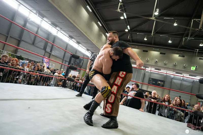 Watschclub Wrestlers Grappling Intensely at Vienna ComicCon 2022 Ring