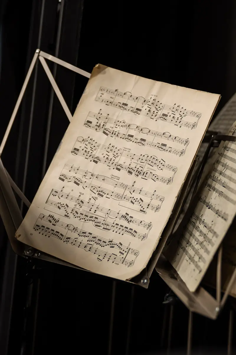 Vintage Musical Score on Music Stand in Dramatic Black and White