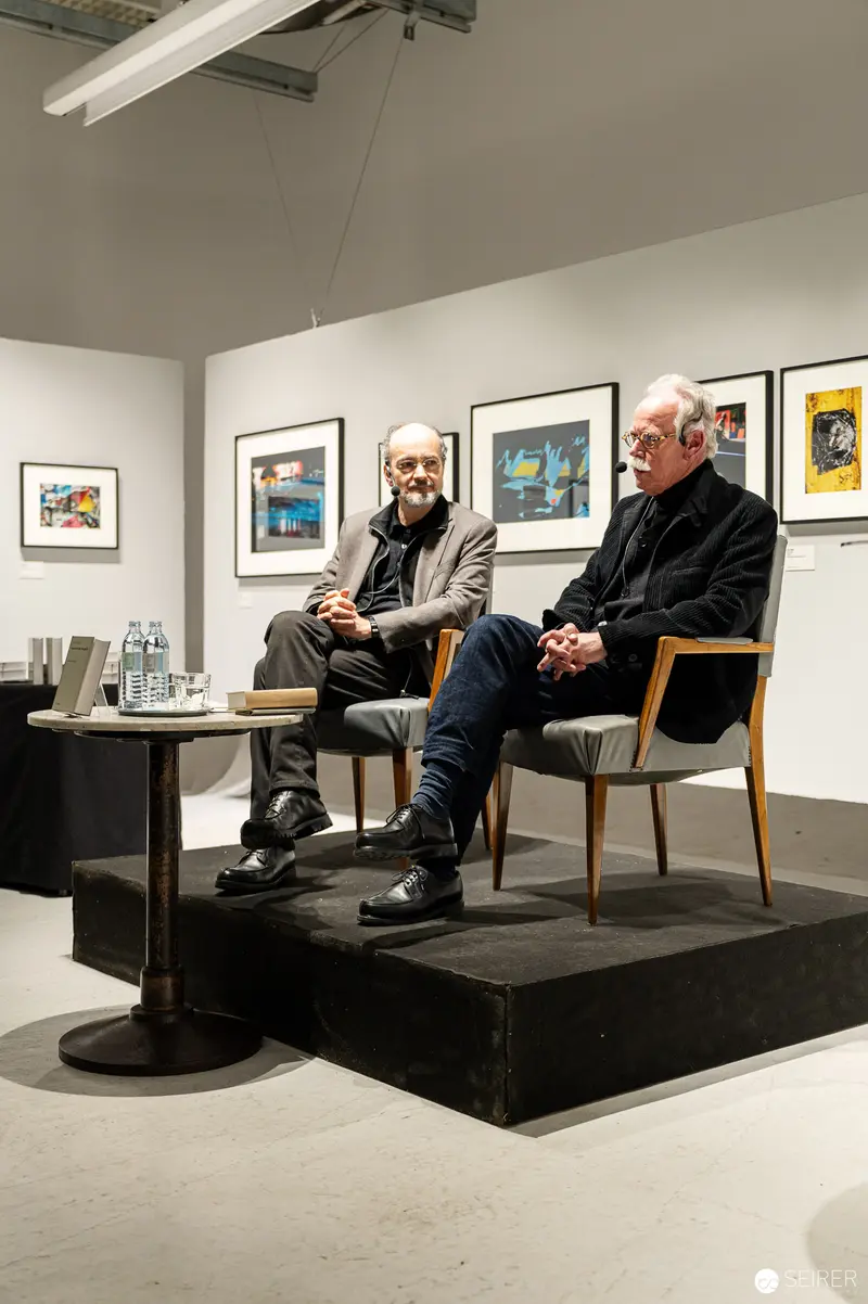 Hans-Michael Koetzle and Colleague Discuss Photography at Gallery Exhibition