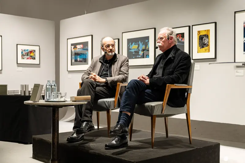 Hans-Michael Koetzle and Colleague Discuss Photography at Gallery Exhibition