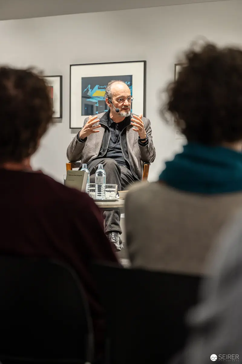 Hans-Michael Koetzle Lecturing on Photography at Westlicht Gallery Event