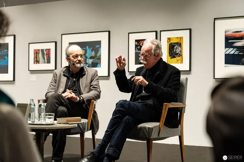 Hans-Michael Koetzle and Colleague Discuss Photography at Gallery Exhibition