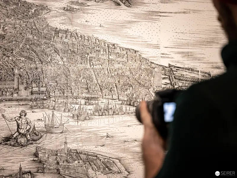 Detailed Engraving of Historic Cityscape with Photographer Capturing Architectural Print