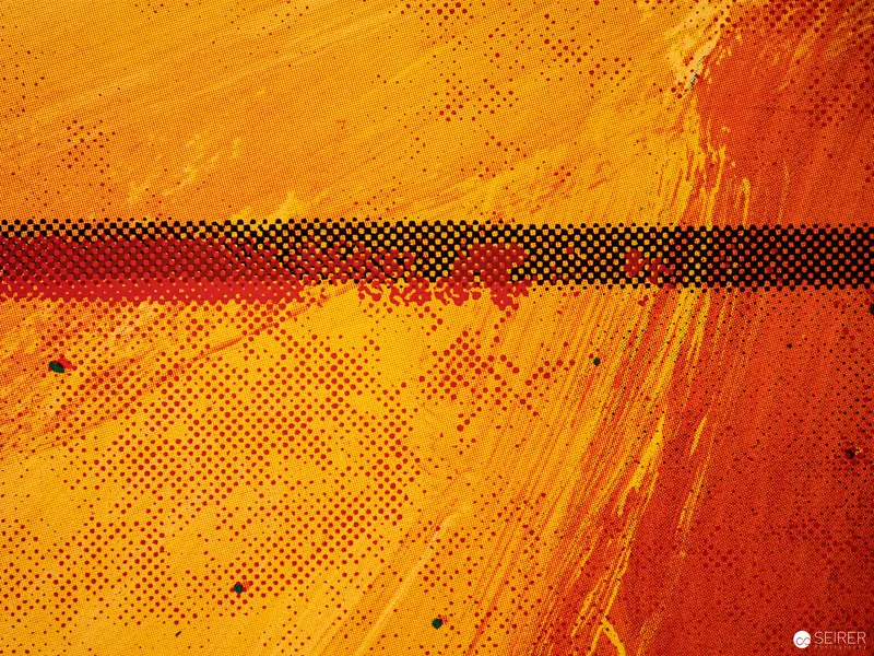 Abstract Halftone Composition in Vibrant Yellow and Red Tones