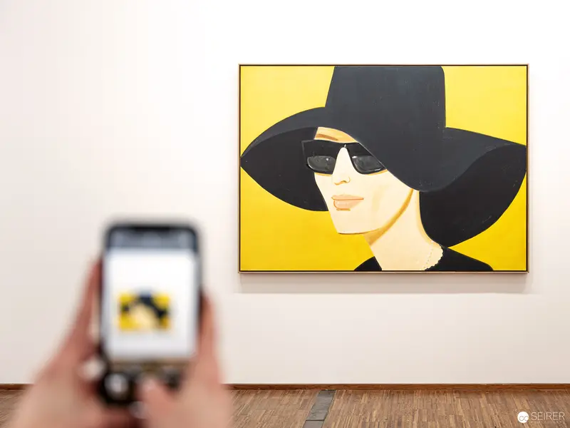 Alex Katz's Yellow Portrait: Stylized Figure in Wide-Brimmed Hat and Sunglasses