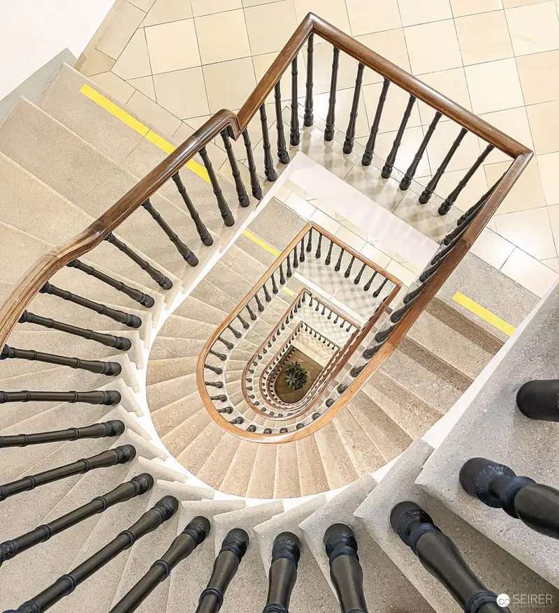 Spiral Descent: Architectural Staircase at Webster University Vienna