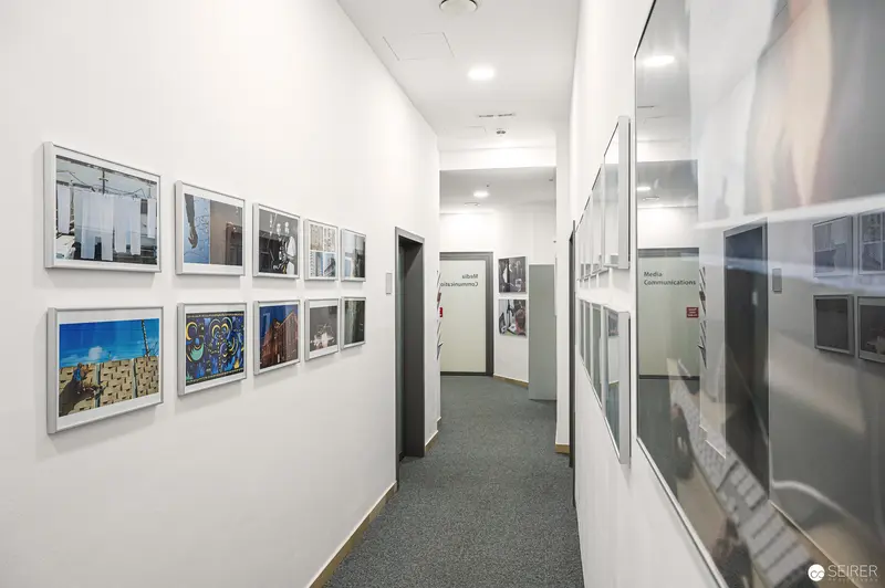 Interior Corridor Gallery at Webster University Vienna: Photographic Exhibition