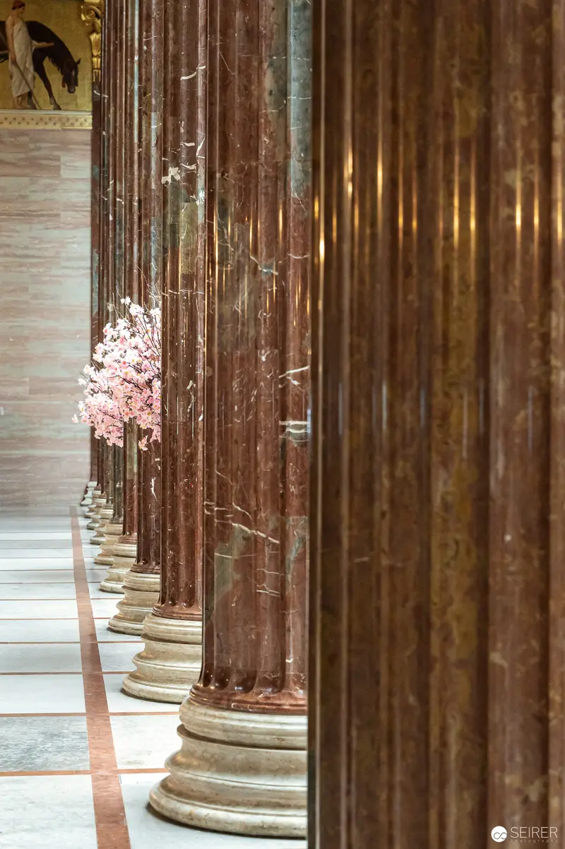 Marble Columns with Delicate Pink Blossoms in Vienna Parliament Interior