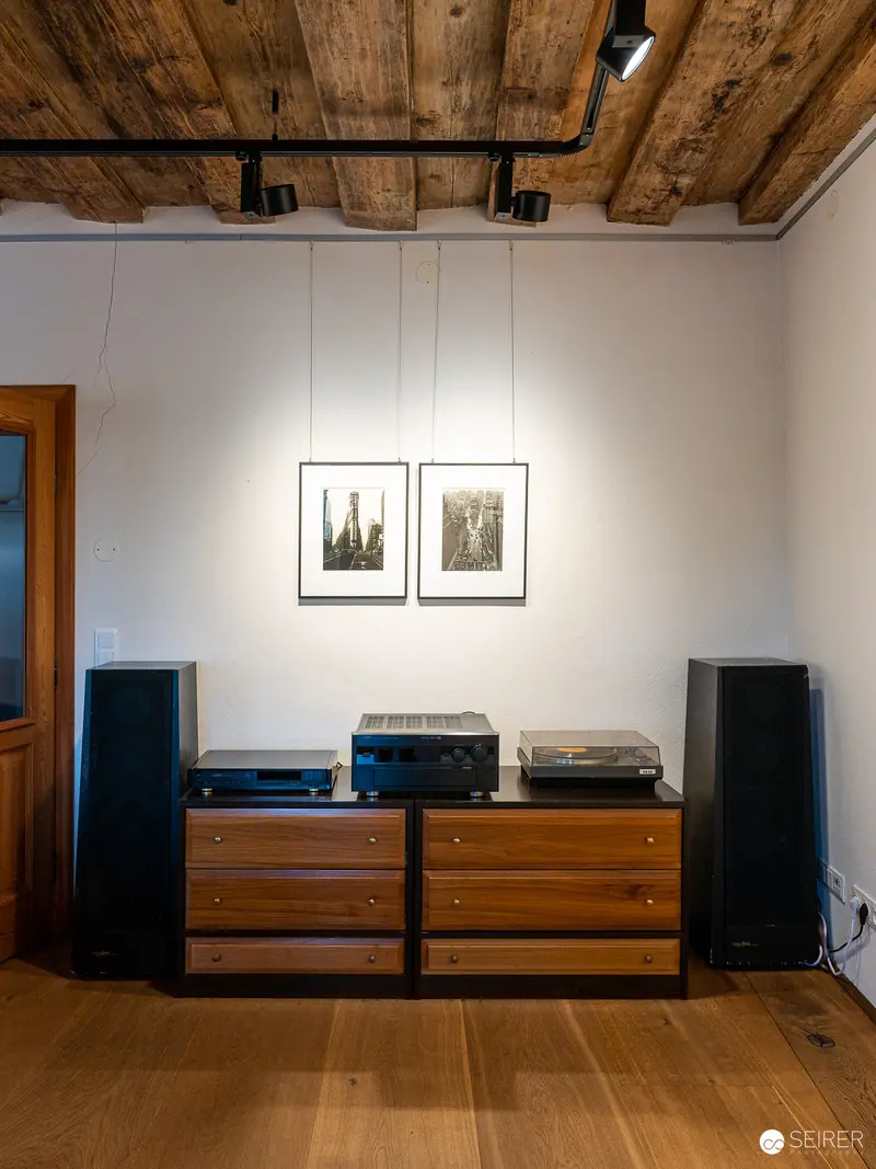 Audiophile's Sanctuary: Vintage Audio Setup in Rustic-Modern Interior