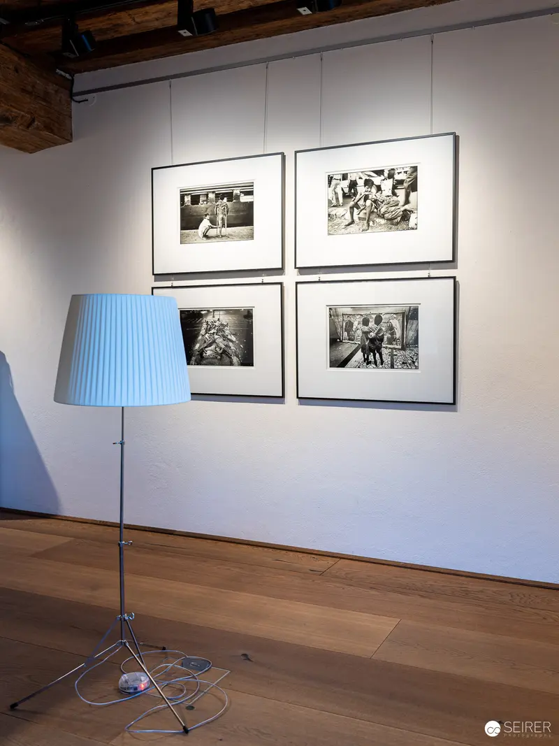 "17 Sisters" Exhibition: Black and White Photographs in Minimalist Gallery Setting