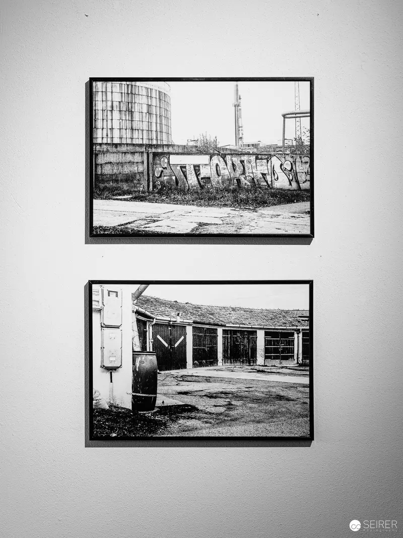 Black and White Industrial Landscape: Urban Decay and Structural Remnants