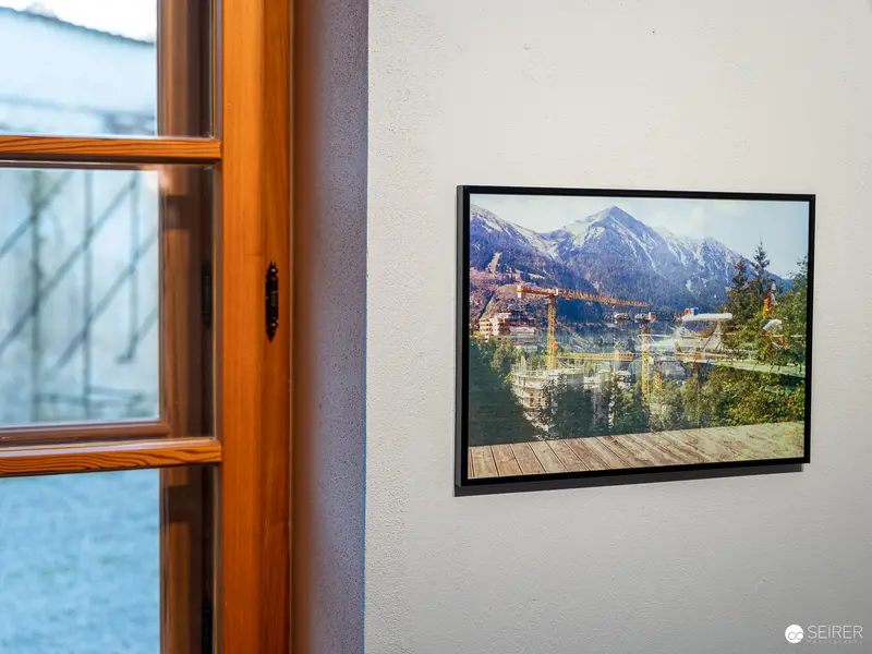 Mountain Landscape Framed by Wooden Window in Contemporary Interior