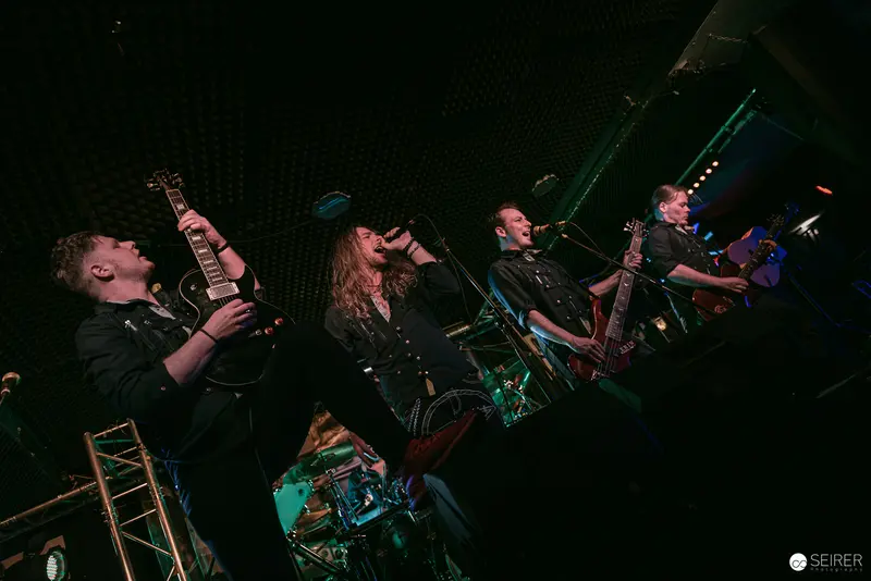 Replugged Band Performing Intense Rock Set at Vienna Venue