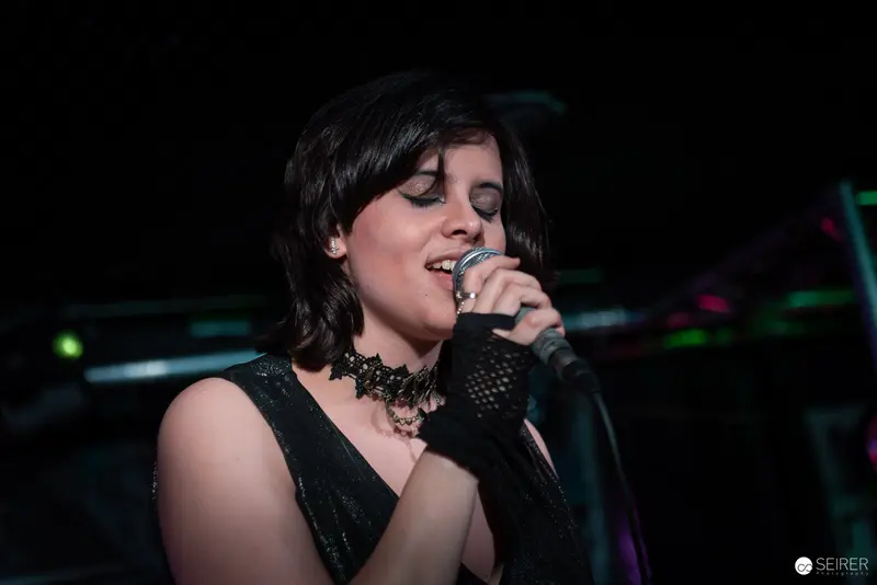 Extreme Mind Vocalist Performing Passionately at Replugged Concert