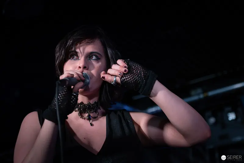 Extreme Mind Vocalist Performing Intense Rock Set at Replugged Concert