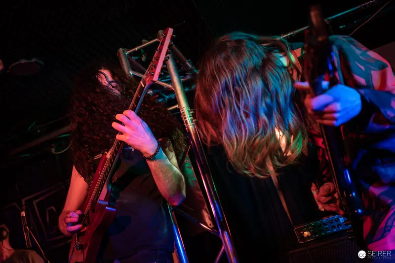 Extreme Mind Performing at Replugged: Intense Rock Concert Moment