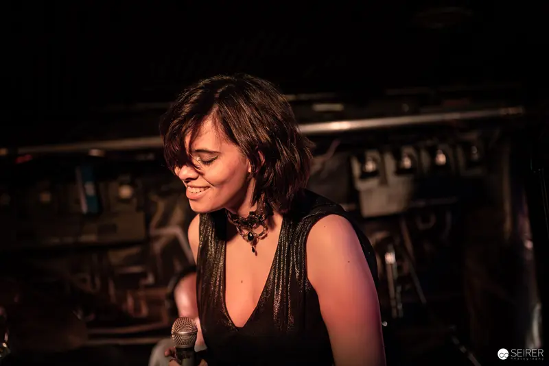 Extreme Mind Vocalist Performing Intimate Set at Replugged Music Venue