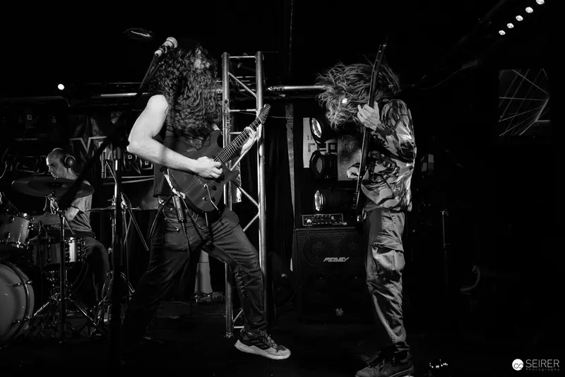 Extreme Mind's Intense Performance at Replugged Live Music Venue
