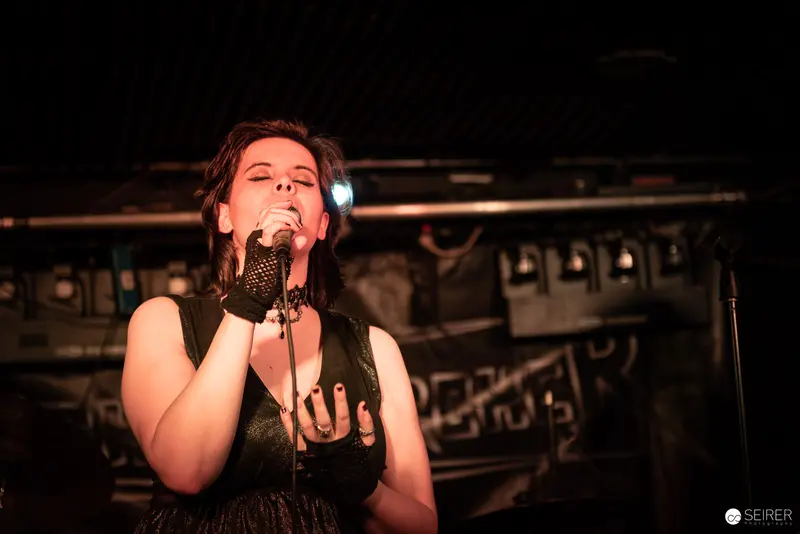 Extreme Mind Vocalist Performs Passionately at Replugged Musical Event