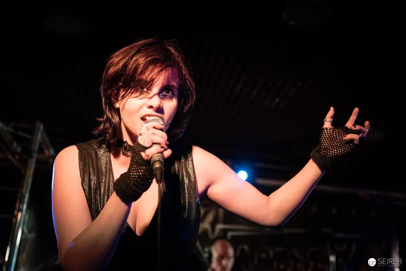 Extreme Mind Vocalist Performing Passionately at Replugged Live Concert