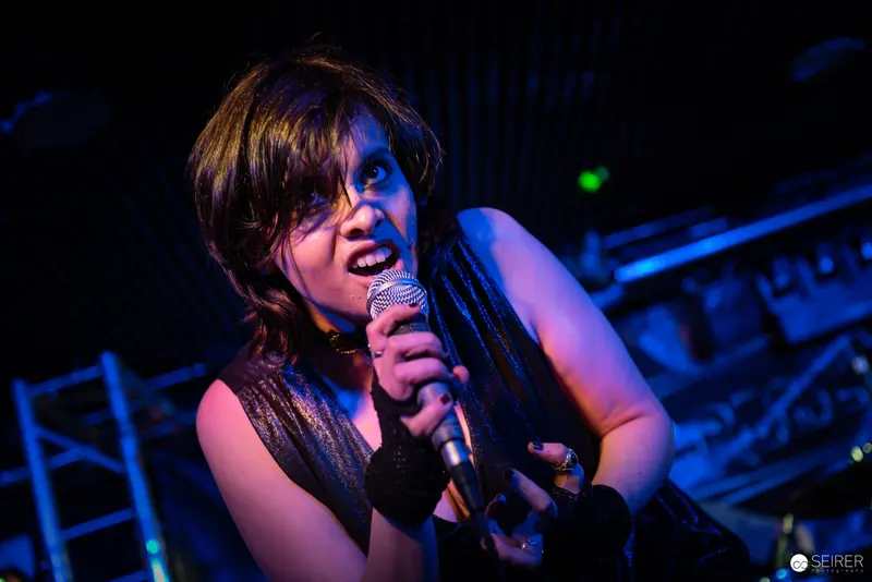 Extreme Mind Vocalist Performing Intensely at Replugged Live Music Event
